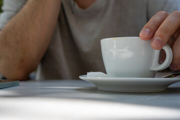 person with cup of coffee