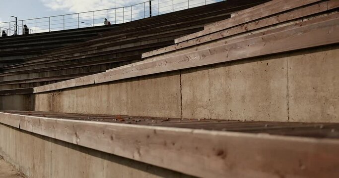 Wooden bleachers seating in the city park