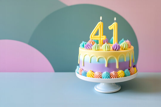 41st birthday cake celebrating 41 years on an isolated, colorful pastel background.