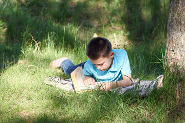 child boy  read book  Holy bible on nature - 800474368