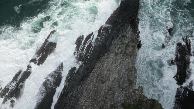 Aerial drone shot of beautiful sea view under cloudy sky