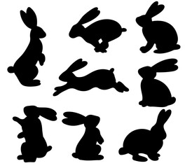 Silhouettes of Easter bunnies. Easter bunny rabbits in different poses. Vector illustration EPS10