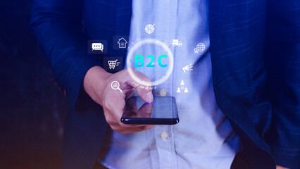 B2C, Business to customer marketing strategy concept. Businessman holding with virtual B2C icon for...