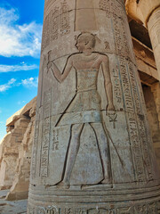 Superb sunken wall relief of Pharoah Ptolemy VIII Euergetes II Tryphon on one of the outer columns at the Temple of Sobek and Haroeris built by Ptolemy pharoahs in Kom Ombo,Near Aswan,Egypt