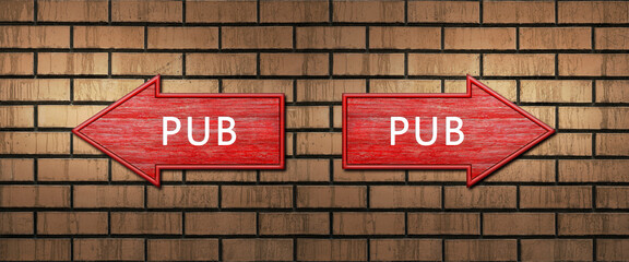 Red wooden arrow signs with the inscription PUB hang on a dark brick wall. Right and left arrow...