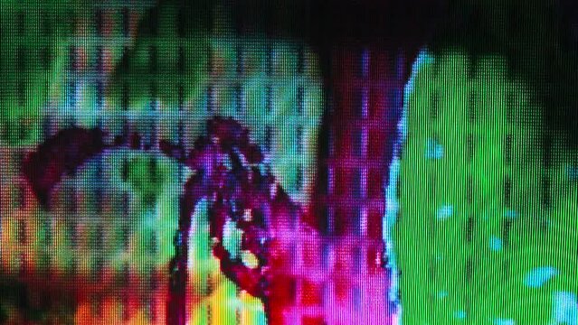 Closeup full frame lockdown shot of colorful abstract CRT glitches moving fast