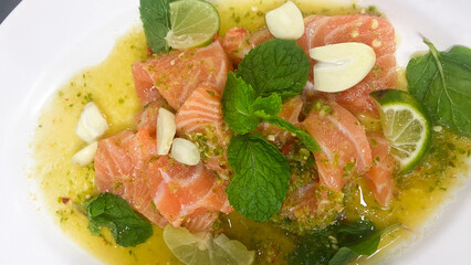 Jeh O Chula michelin star restaurant in Bangkok Thailand famous salmon yum or salmon yam