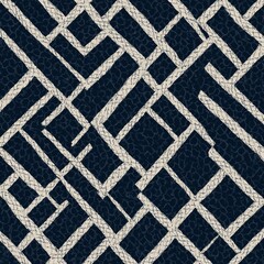 Thick white lines form network of squares, rectangles, crisscrossing over dark blue background. Background has mottled texture, reminiscent of cracked, distressed leather.