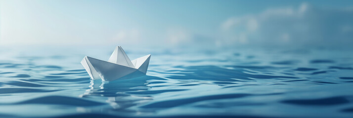 A serene paper origami boat floats on calm blue water, symbolizing tranquility, simplicity and imagination