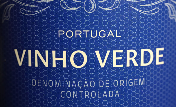 Viersen, Germany - May 9. 2024: Closeup of portuguese wine bottle label with DOC and grape variety lettering Vinho Verde