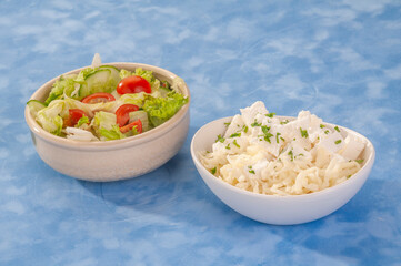 Fattoush and Feta Cheese on a blue background