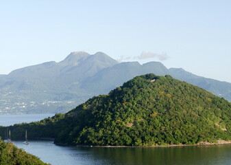 Soufriere volcano seen from Terre de Haut, Les Saintes, Guadeloupe. Hilly landscape of french west...