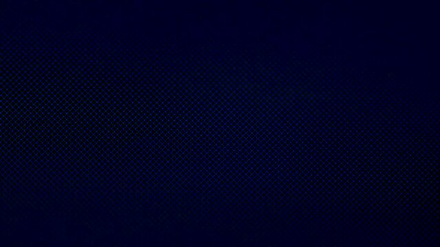 Full frame lockdown shot of abstract pixelated LED screen with blue and yellow CRT glitches changing colors