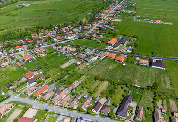 Aerial view with houses and streets in an Eastern European village - Romania
