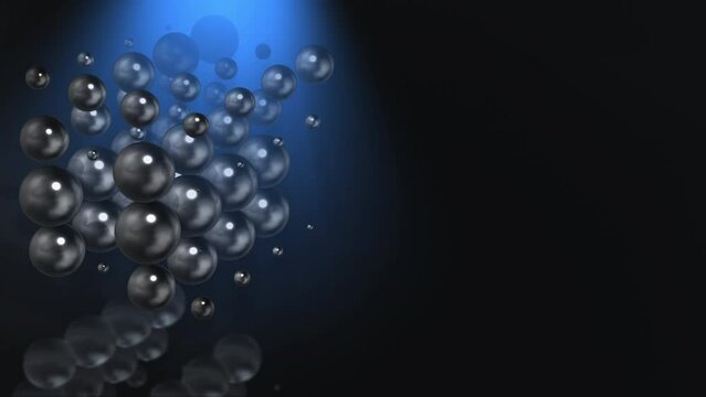 Abstract 3D animation loop of reflective spheres rotating and changing size, with copy space.