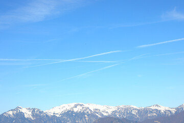 mountain with white chemtrails left by the Ari or something else According to the conspiracy theory