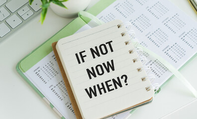 Inspirational quotes - If not now, when, question with paper clip on white table.