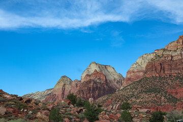 Scenic view of Navajo Sandstone mountain peaks Twin Brothers in Zion National Park in Washington County, Utah, United States, USA. Southwest aspect centered, viewed from Springdale. Uninhabited canyon