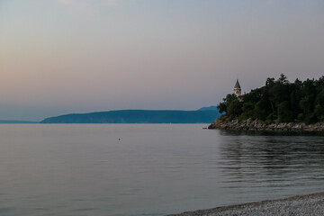 A close up on a tower between the trees along the shore of Medveja, Croatia. The Mediterranean Sea...