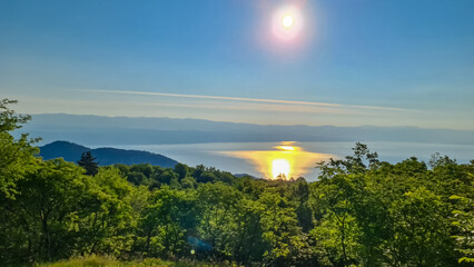 A panoramic view on the Mediterranean Sea in Croatia. The sun has just risen, leaving the sky still...