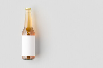Clear longneck beer bottle mockup with blank label and copyspace.