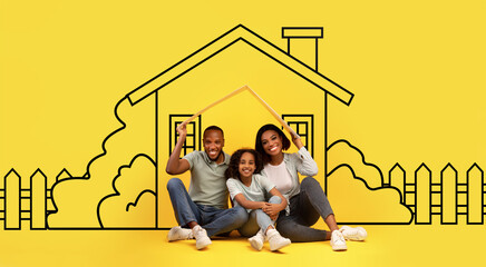 Cheerful black family of three looking at illustrated house