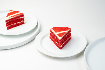 Red velvet cake on w white plate