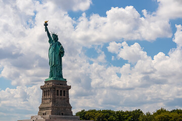 Iconic representation of freedom and independence, the Statue of Liberty with flaming torch on...