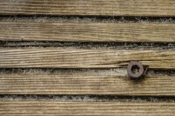 texture, old wooden structure with sand
