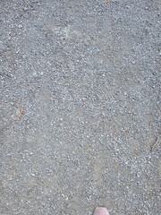 gray solid background of fine gravel crumbly texture