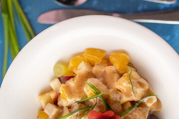 Fruit salad served on a table
