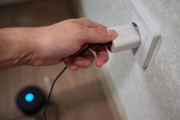 Turning off appliances that are not working saves energy. Unused phone chargers or power adapters.