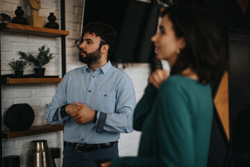 Fototapeta premium Focused business colleagues engaged in a productive conversation about project nuances, expenses, and strategic planning.