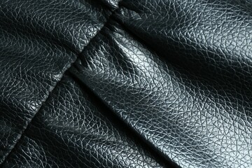 Fototapeta premium Black leather with seam as background, top view