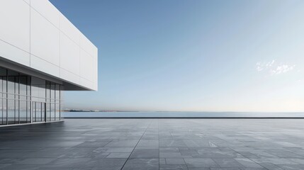 A tranquil scene featuring a minimalist modern building exterior against a clear blue sky, emphasizing simplicity and clean design