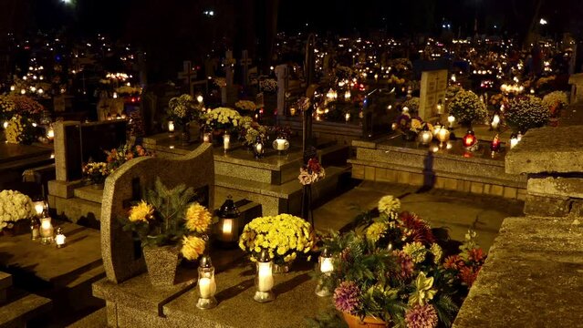 ZAMOSC, POLAND - NOVEMBER 1 2017: Cemetery Roman Catholic with lighted lanterns memorial on the Polish holiday All Saints Day.