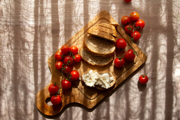 Girls dinner with bread ,chottage cheese and cherry tomateos