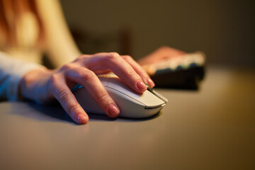 close up of pro cyber sport gamer hands play game with RGB keyboard and mouse