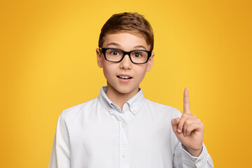 Smart teen boy in glasses having idea