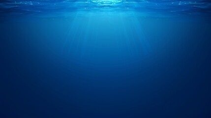 Deep blue underwater seascape with sunlight rays