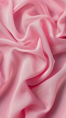 Obraz premium A pink fabric with a wave pattern. The fabric is soft and smooth to the touch. The color pink is vibrant and eye-catching, making the fabric stand out