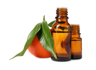 Aromatic tangerine essential oil in bottles and citrus fruit isolated on white