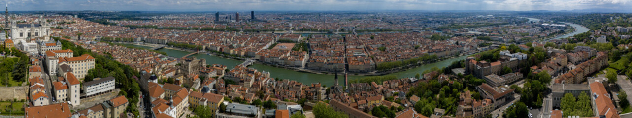 Fototapeta na wymiar Aerial view of the Basilica of Notre-Dame de Fourvière and all the skyline of the city of Lyon. France. 