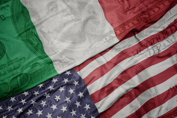 Obraz premium waving colorful flag of united states of america and national flag of italy on the dollar money background. finance concept. macro