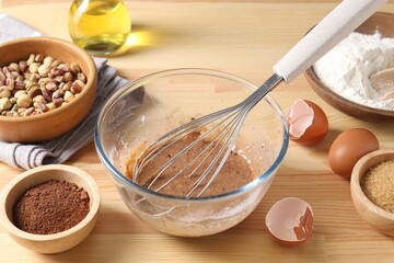 Ingredients for homemade dough on wooden table