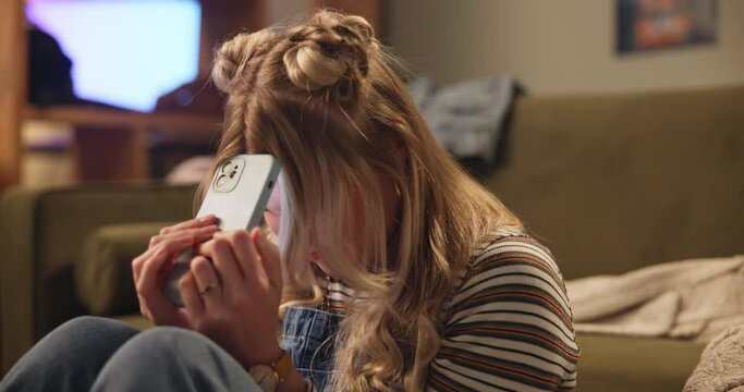 College student, smartphone and frustrated by sofa for exam results with university or school. Woman, phone and sad in house living room for test score, report or rejected application by couch