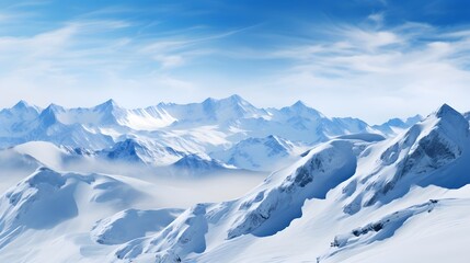 Winter mountains panorama with snow covered peaks and deep blue sky.