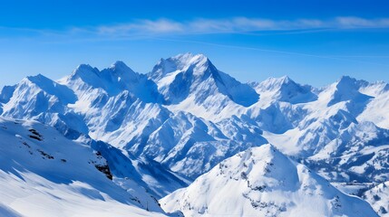 Panoramic view of snow-capped alpine peaks.