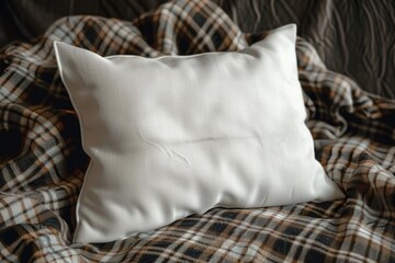 A white pillow placed on a bed. Ideal for interior design concepts