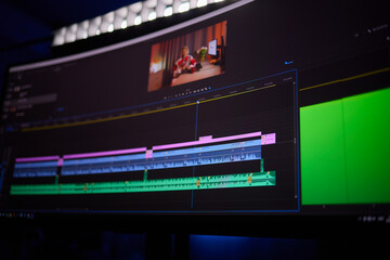 A multimedia flat panel display gadget edits video with a green screen